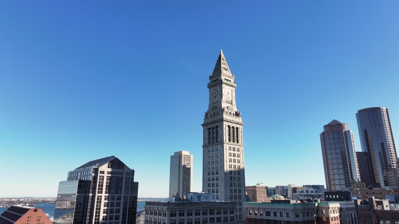Custom House Tower and downtown Boston buildings, skyscrapers. Aerial orbit. Financial district in Boston, Massachusetts.