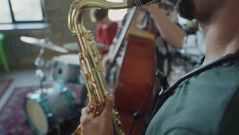 jazz band rehearsal with saxophone player