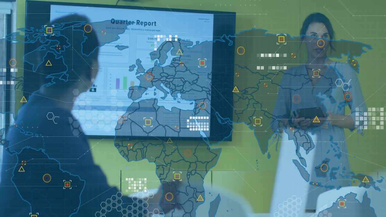 Woman presenter holding tablet and pointing at display, showing global business map and charts