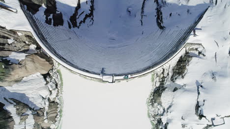 aerial of a dam in winter