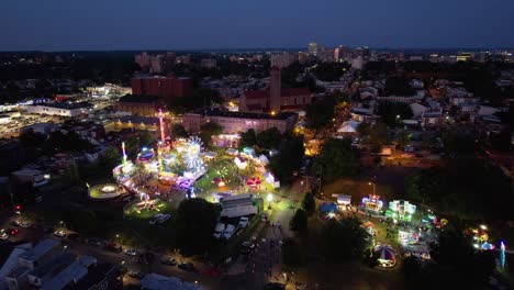 night-summer-carnival-festival-descending-drone-rides-food-vendors-Wilmington-Delaware