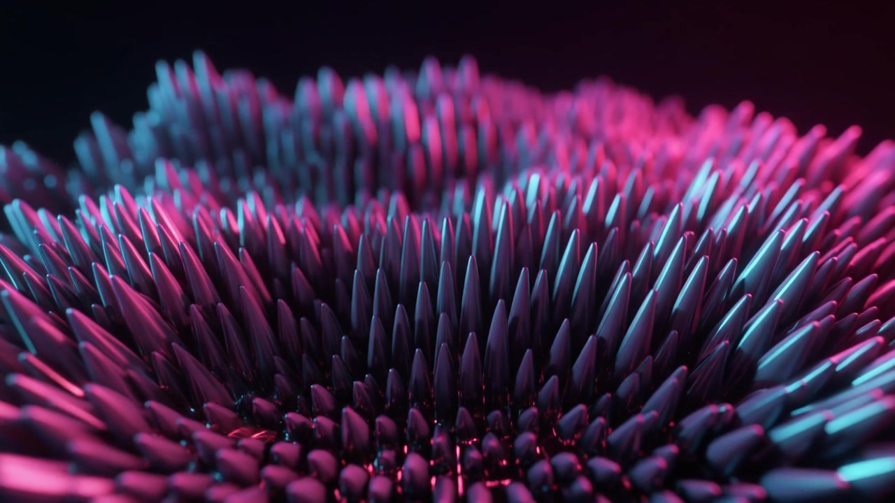 Abstract Ferrofluid Spikes Moving in Neon Pink and Blue Light