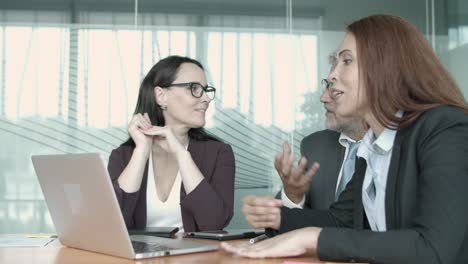 content businesswoman explaining project and gesturing