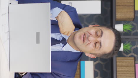 Vertical-video-of-Businessman-talking-facetime-through-camera.