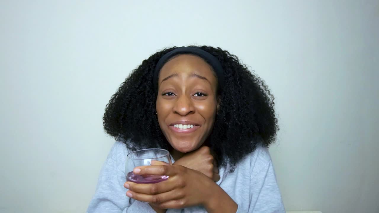 Young Student Telling Good News to Camera During Video Call with Friends