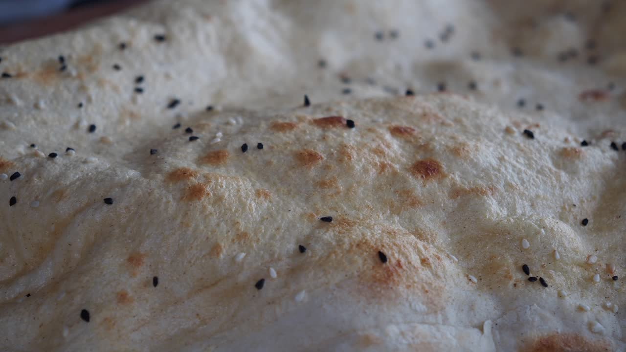Close-up of freshly baked bread with sesame seeds