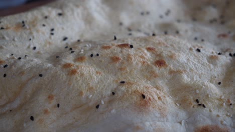 close-up of freshly baked bread with sesame seeds