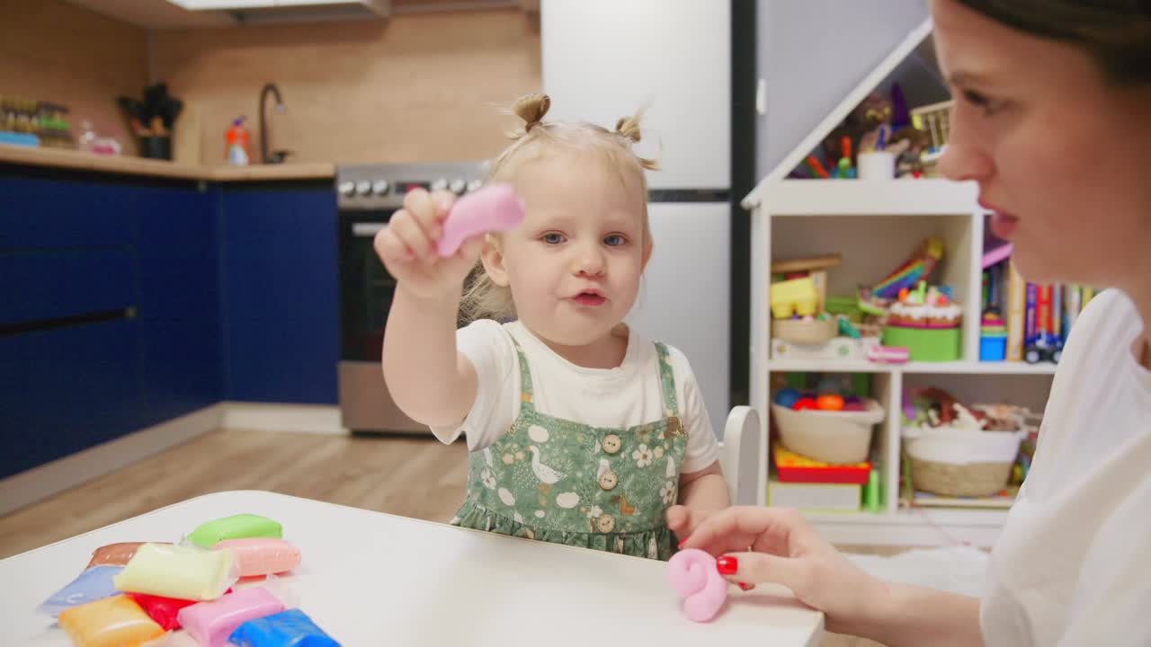 Mother and Toddler Daughter Playing with Colorful Modeling Clay