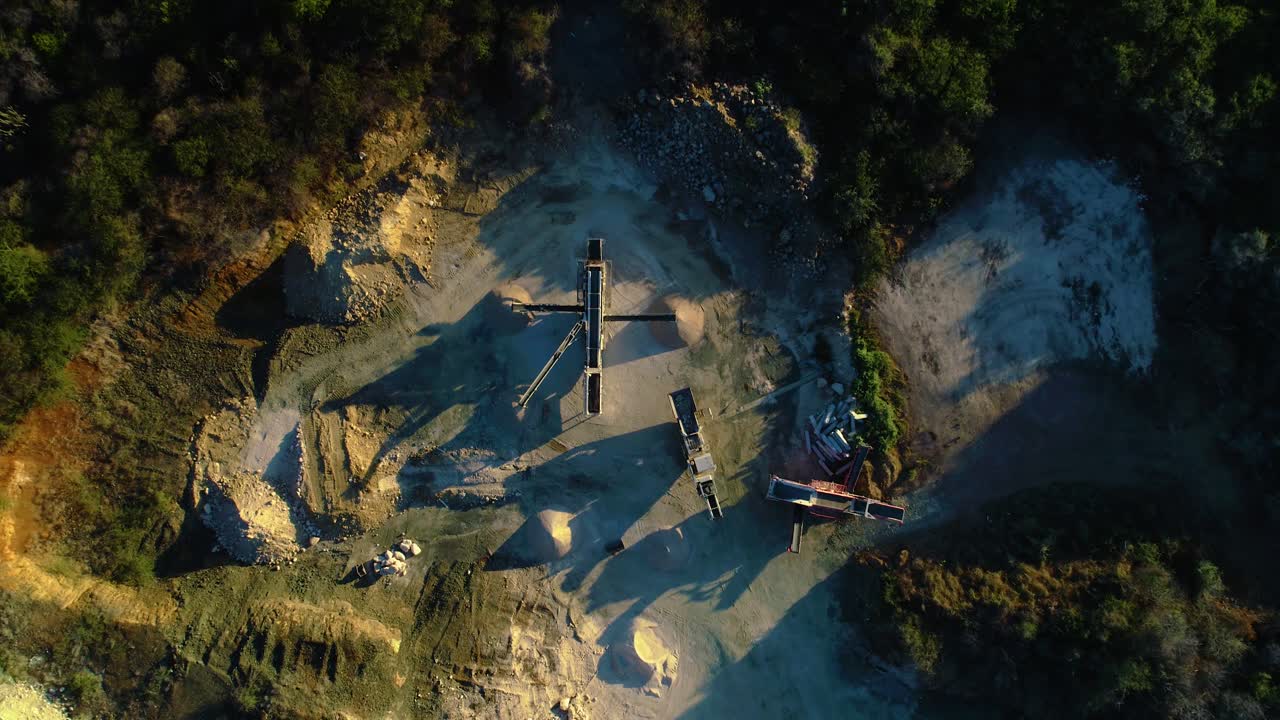 Top down bird's eye view descend linear overpile portal reclaiming chutes piles