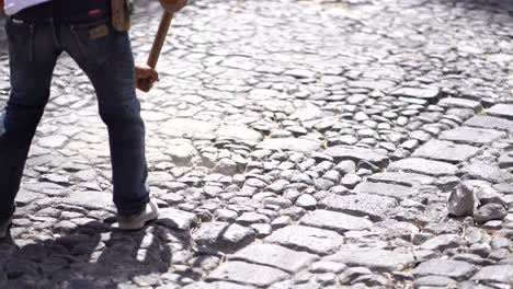 worker using pickaxe. constructor in latin america
