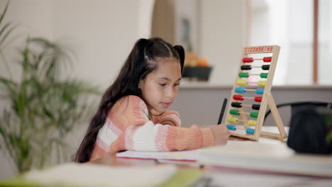 girl, child and writing in book with abacus