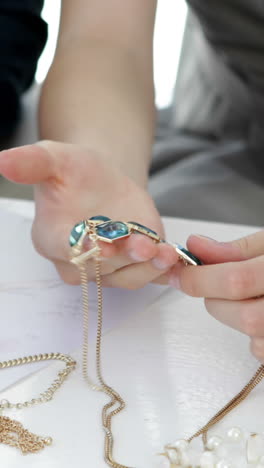 design team looking at costume jewelry