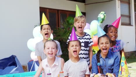 Kids-having-fun-at-the-backyard-of-house-4k