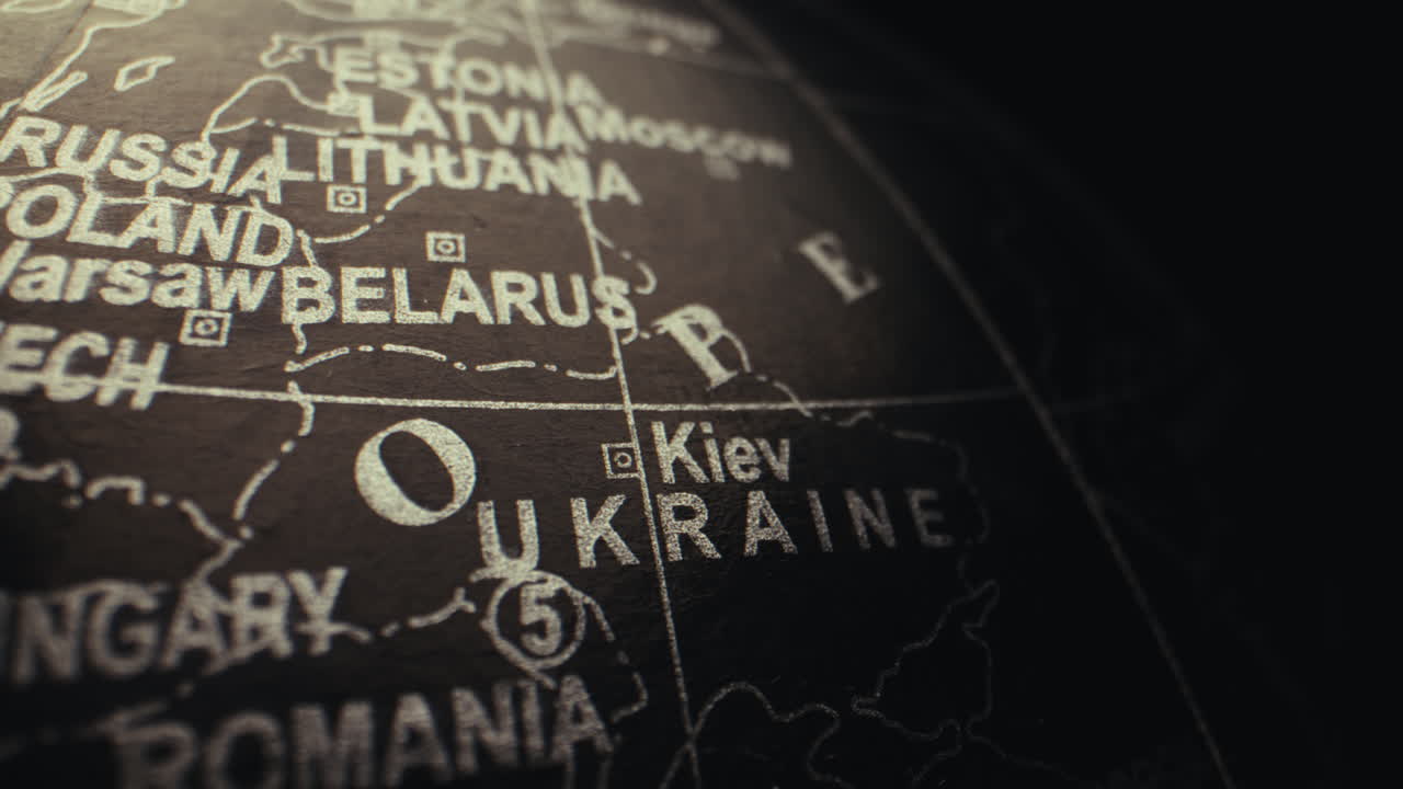 Close-up of a world globe, highlighting Ukraine and surrounding regions