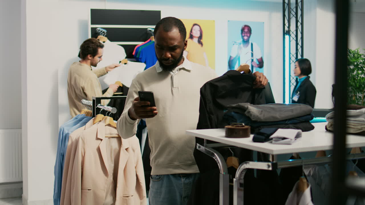 People shopping for clothes in a clothing store