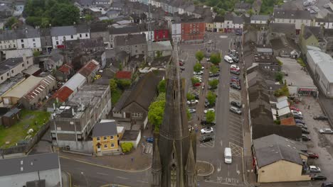 Saint-Michael's-Church-in-Ballinasloe-Galway-above-city-streets-as-cars-drive-around-on-wet-day