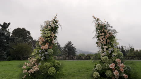 floral wedding arch in a garden