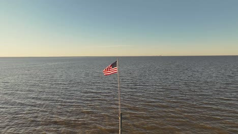 drone view of the american flag near the american legion in fairhope alabama