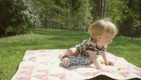 HEARTBREAKING-shot-of-a-cute-child-with-a-leg-in-a-cast-trying-to-move-around