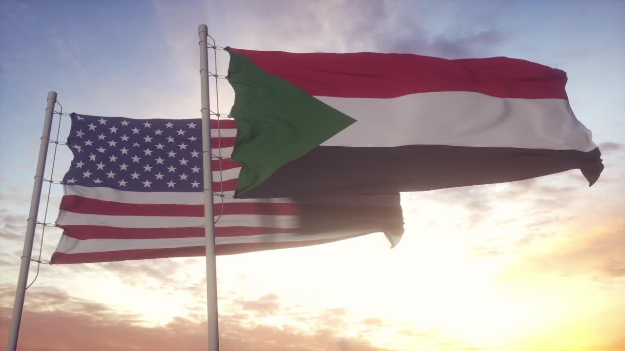 Sudan and United States flag on flagpole. Sudan and USA waving flag in wind. Sudan and United States diplomatic concept