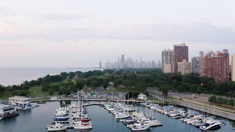 drone flying above harbor in downtown chicago