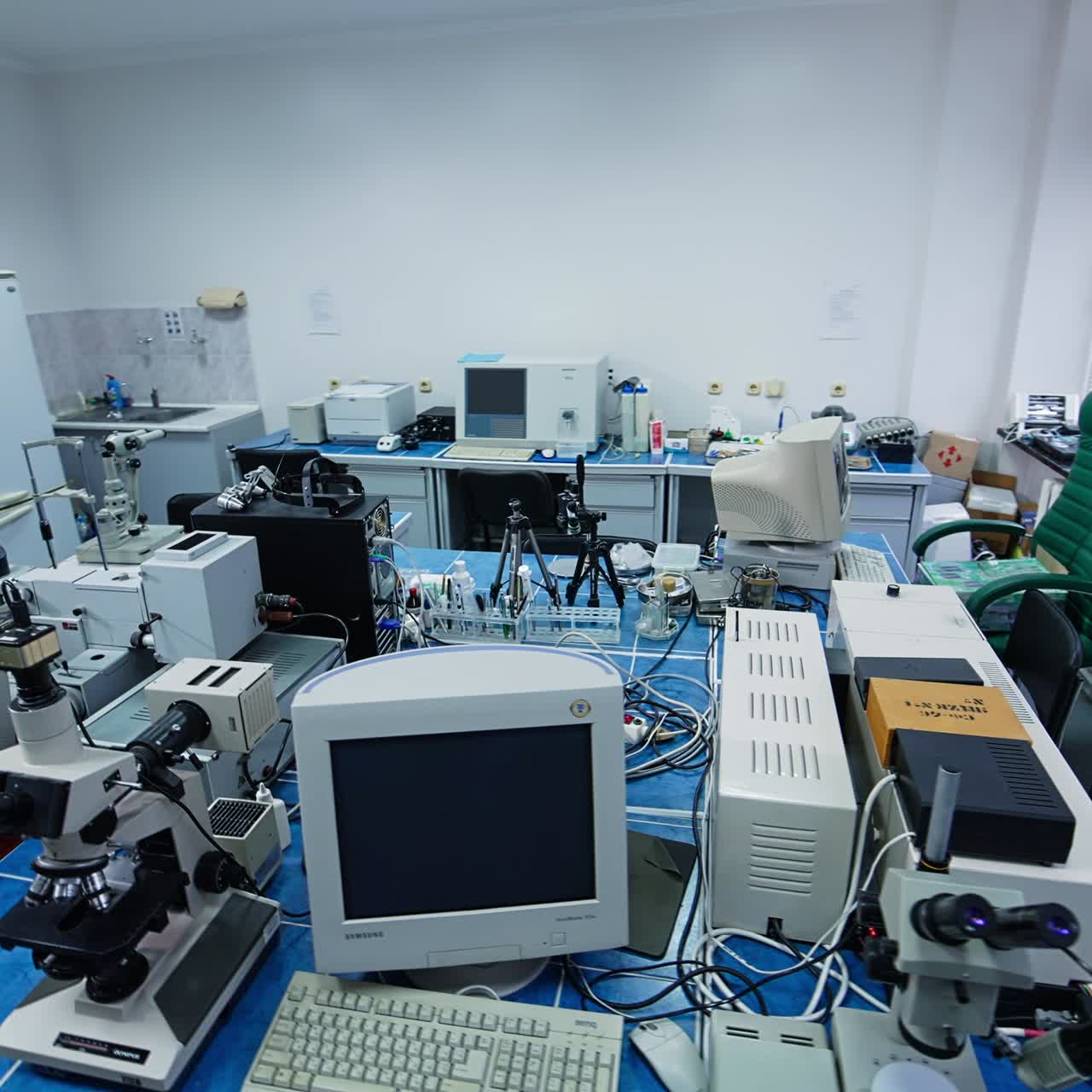 Medical laboratory for analysis in modern hospital. Well-equipped room for tests and researches. Microscopes, computers and other apparatuses in laboratory