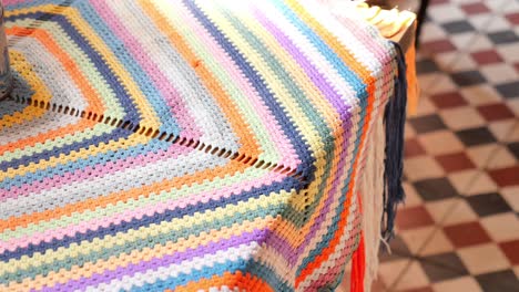 crocheted tablecloth with vibrant colors