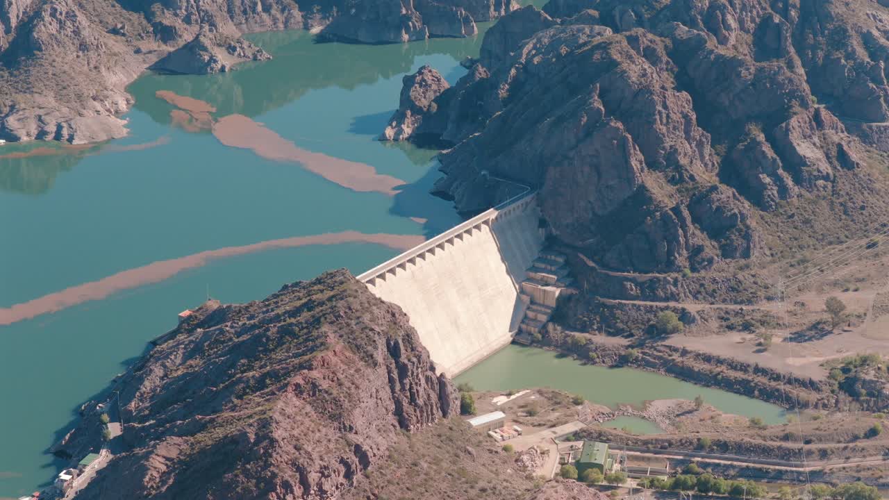 Aerial view of Valle Grande Dam and Reservoir in Mendoza, Argentina, Renewable Hydropower Infrastructure