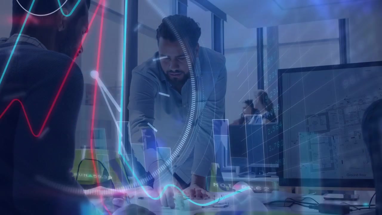 Business peer gesturing, lead leaning and pointing, data overlays rising around hands for planning