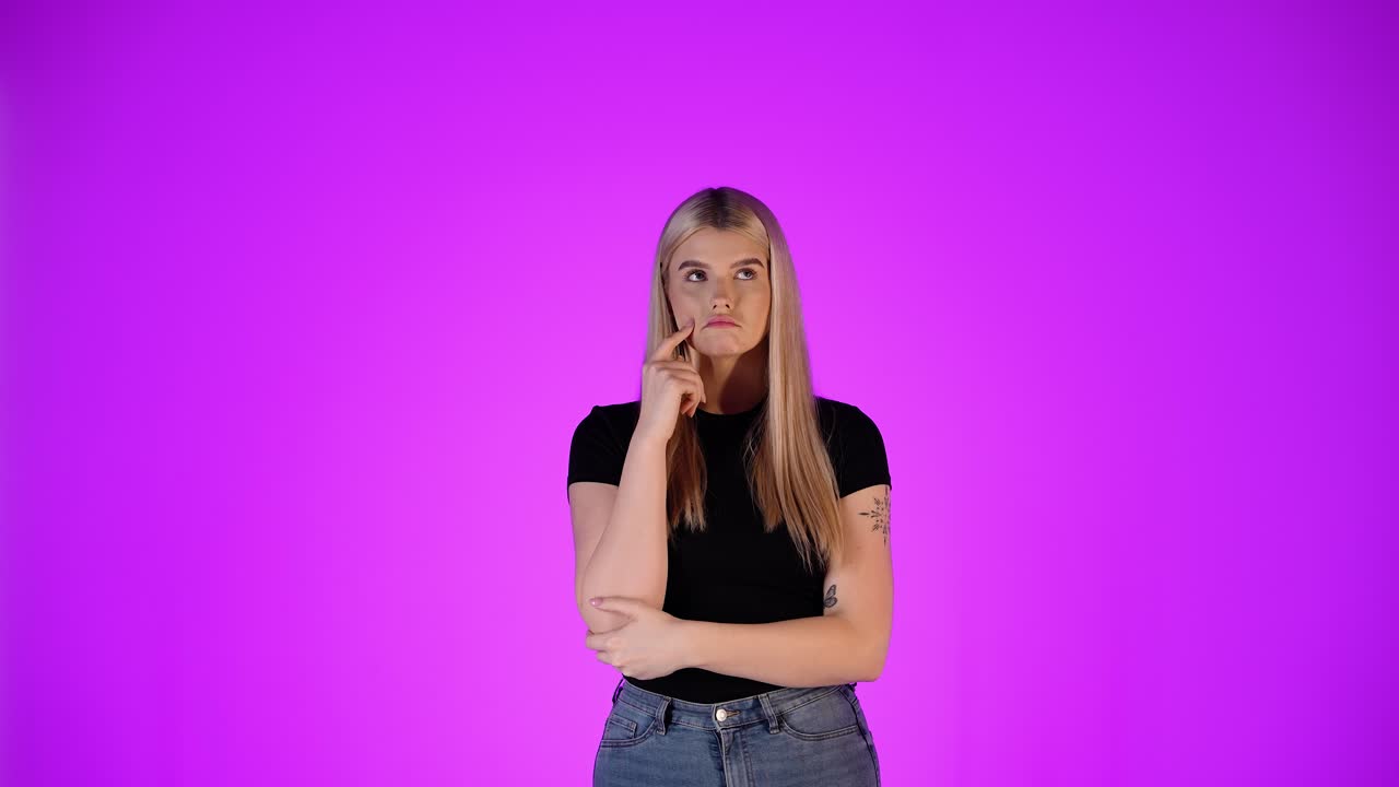 Thoughtful Young Woman with Blonde Hair