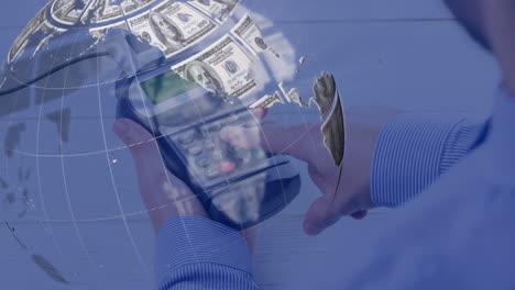 animación del globo formado con billetes de dólares estadounidenses a través de la terminal de pago