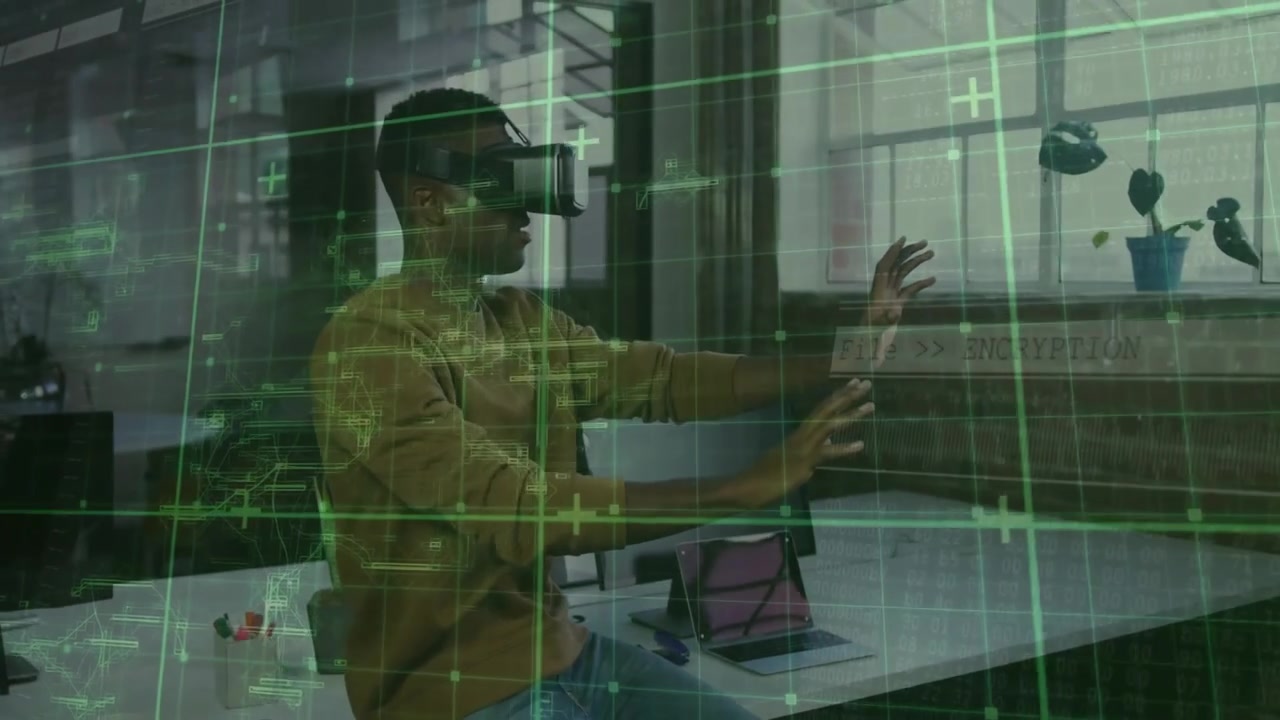 Man using VR headset reaching forward at loft office, showing green grid encryption interface
