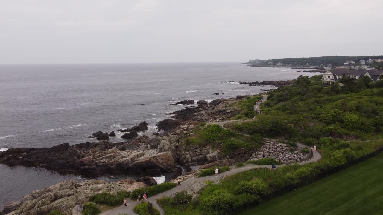Aerial view of marginal way trail on the coastline of Ogunquit Maine USA while tourist pedestrian walking and bicycling the coastline
