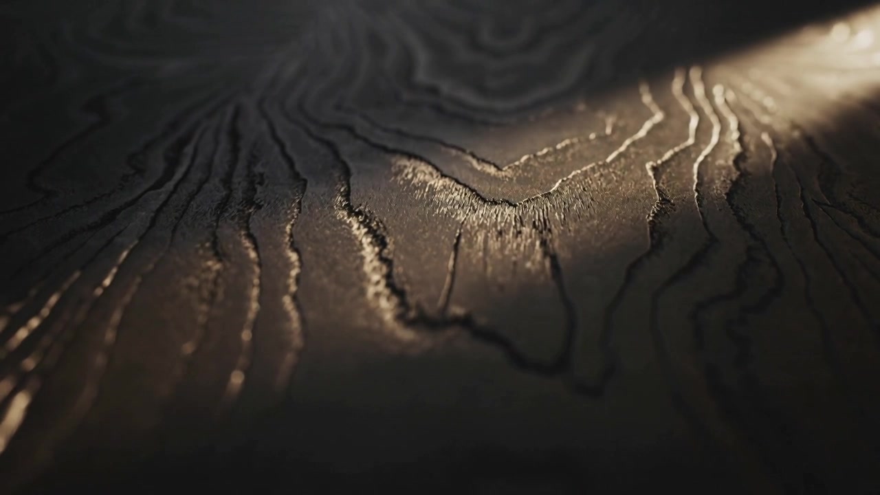 Shifting narrow warm light and focus shifting revealing textured surface in macro showing grooves