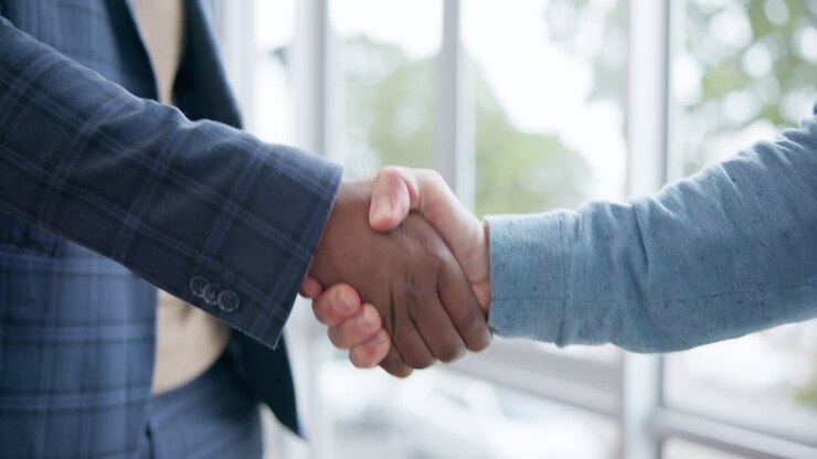 Business men, office and shaking hands for deal