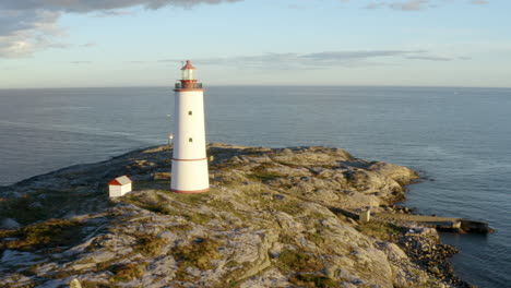 lille torungen lighthouse on rocky island near store torungen lighthouse in arendal, norway