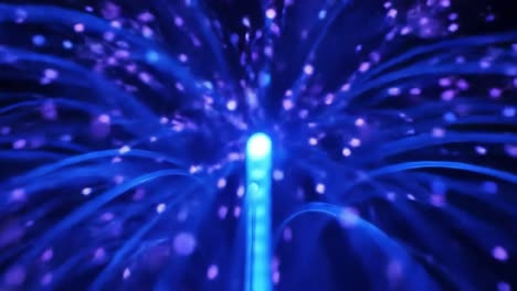 experience a captivating array of colorful light effects swirling and pulsating with energy. this mesmerizing display showcases vibrant blues and purples creating a dynamic atmosphere.