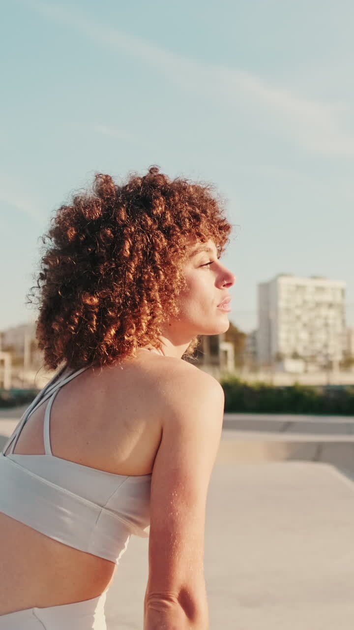 Fitness Woman Taking A Break At Skate Park