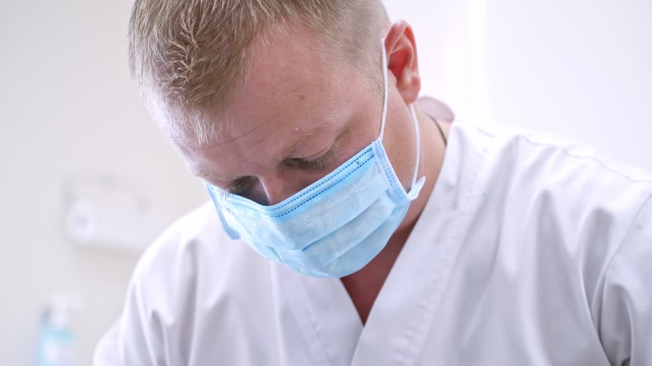 Doctor treats patient teeth in modern dental clinic. Health teeth concept.