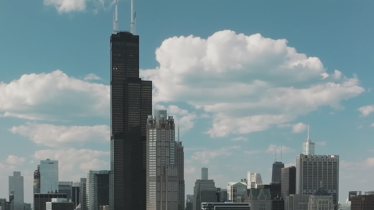 View from above shows buildings and clouds in Chicago