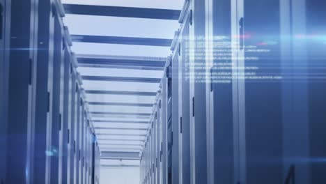 computer servers in a server room with glowing lights