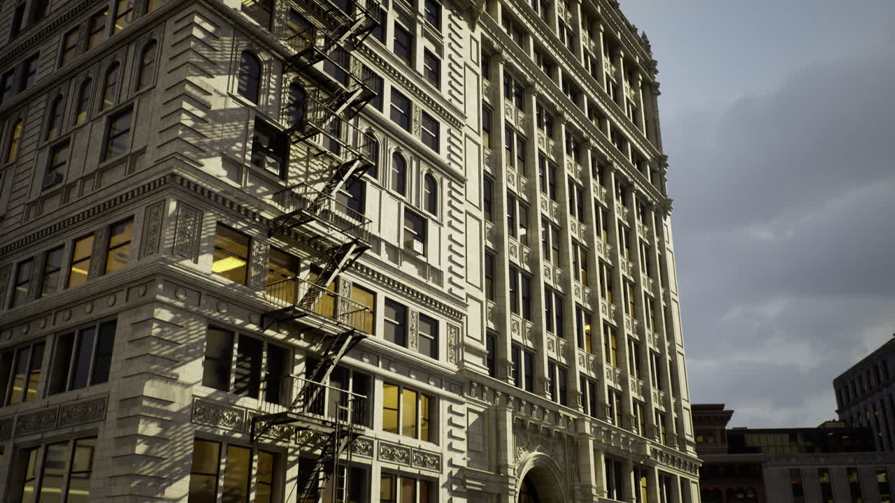 Historic building featuring ornate architecture and fire escape at dusk