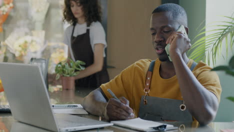 florist employee taking a phone call
