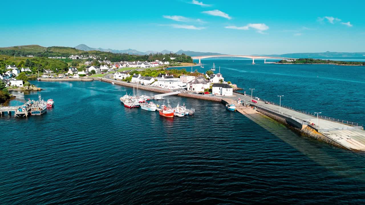 Coastal Town with Bridge and Boats