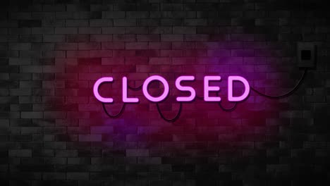 closed neon sign on brick wall background. business and service concept.