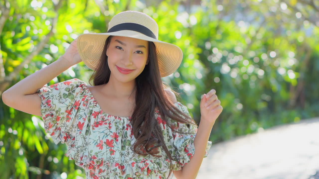 Beautiful Asian woman posing for a photo on her travels in Thailand