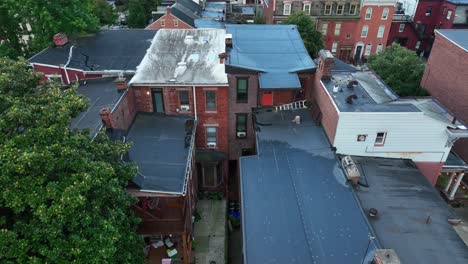 Rear-of-apartment-building-house-with-fire-escape-stairs