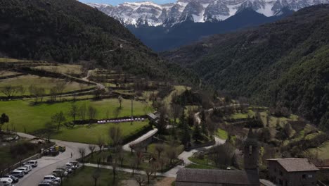 Aerial-views-of-an-old-village-with-a-romanesque-church-in-the-pyrenees-in-Spain