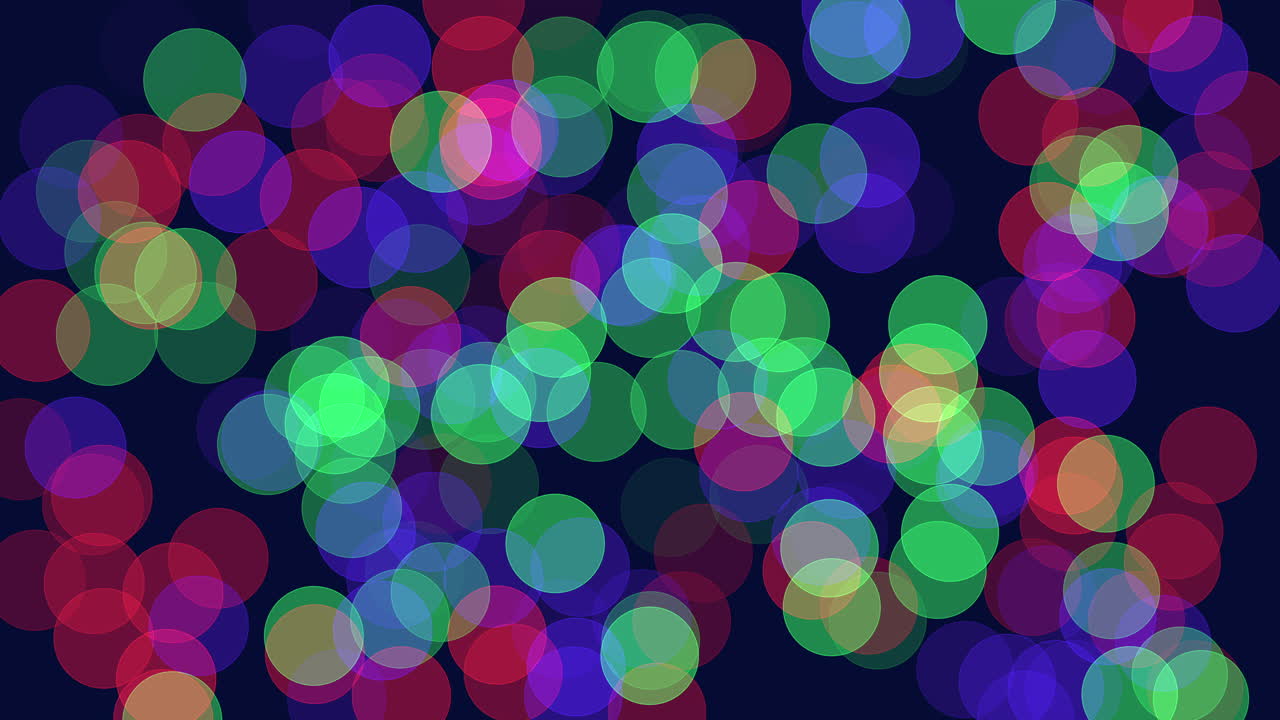 Vibrant colored circles in a circular formation against a dark background create a visually captivating and dynamic pattern, offering a play of colors and symmetry