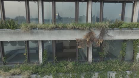 Aerial-Drone-Shot-Krakow-Poland-Abandoned-Soviet-Brutalist-Structure-Hala-Forum-at-Sunrise